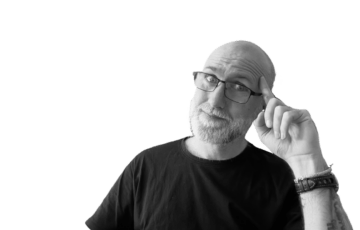 Andre zeigt sich an den Kopf, um das Mindset von Selbständigen zu verdeutlichen